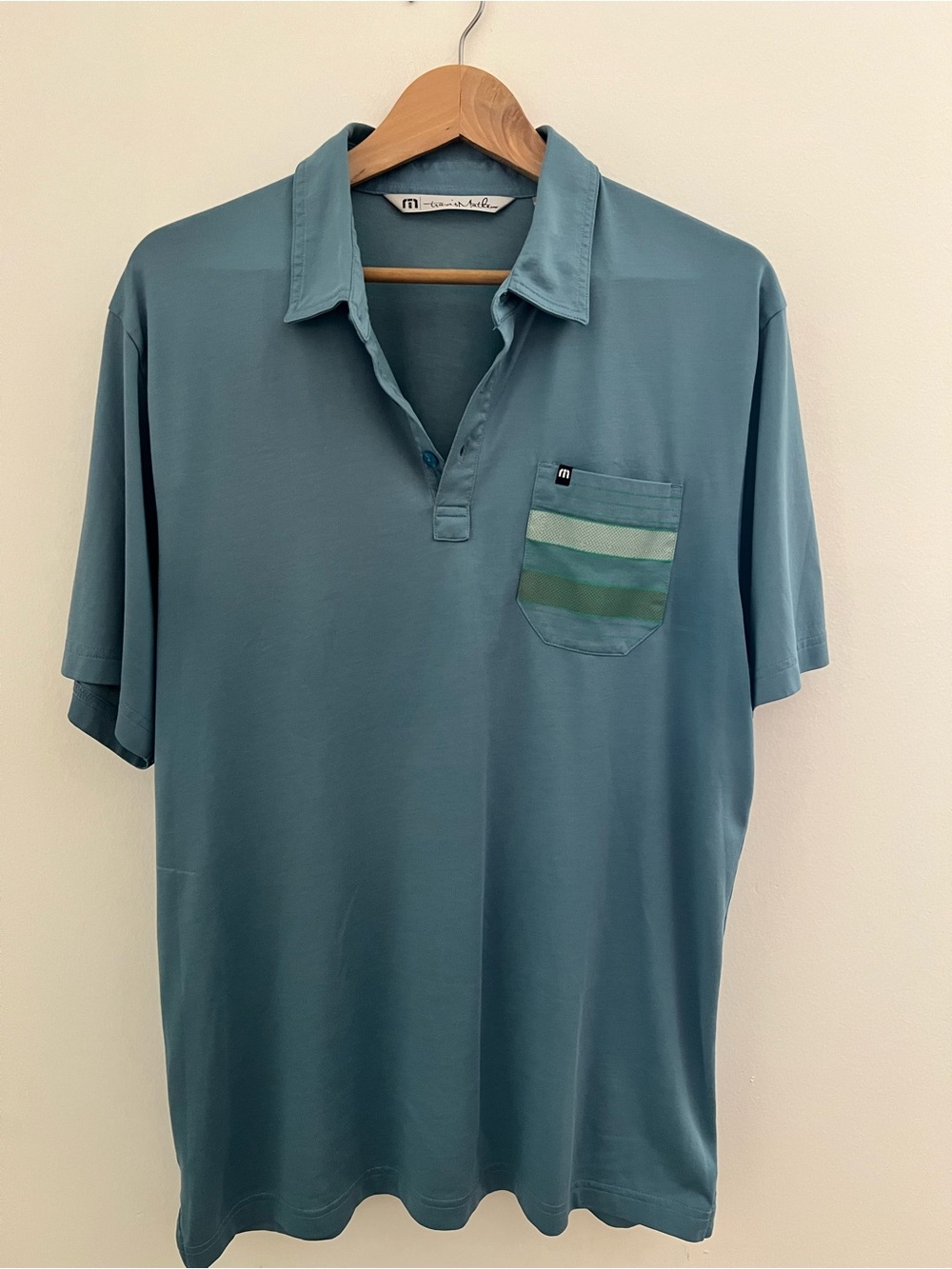 Travis Mathew Teal Short-Sleeve Polo with Striped Pocket